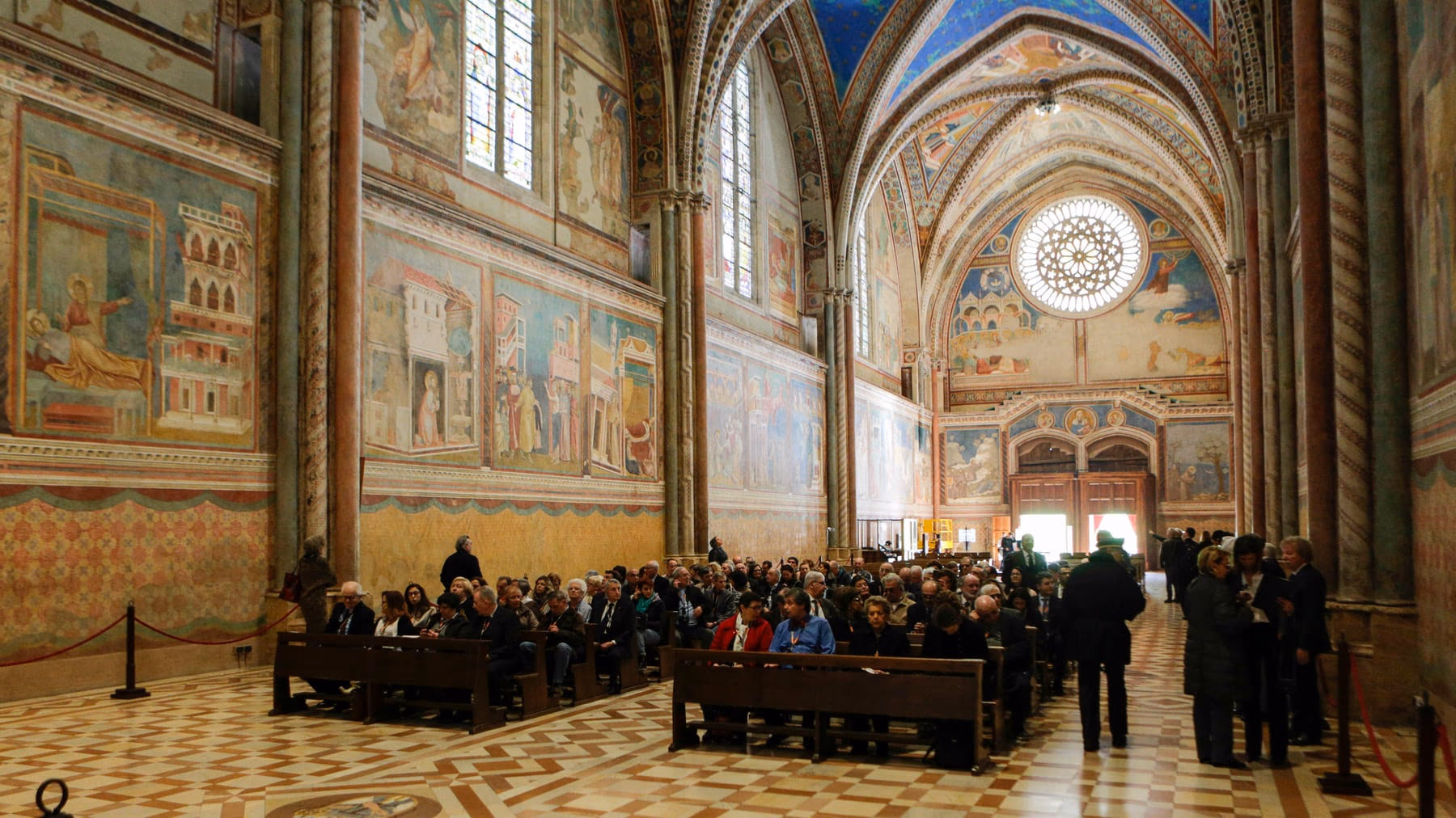 The official presentation of Sacra Vestigia in the Sacred Convent of Assisi, the basilica packed with people.