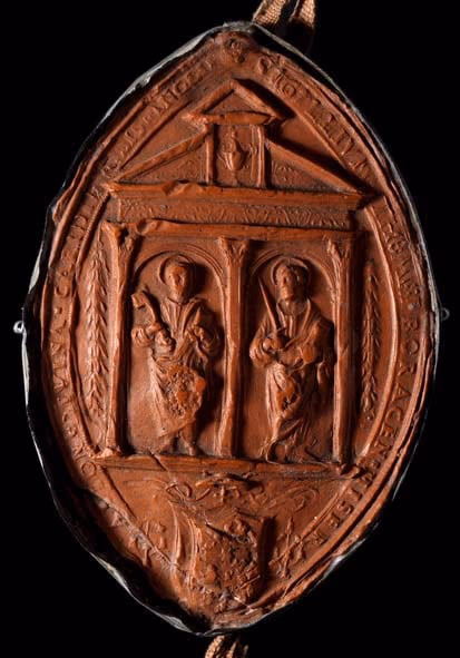 The red wax seal of Thomas Wolsey, almond shaped, with its impressed figures.